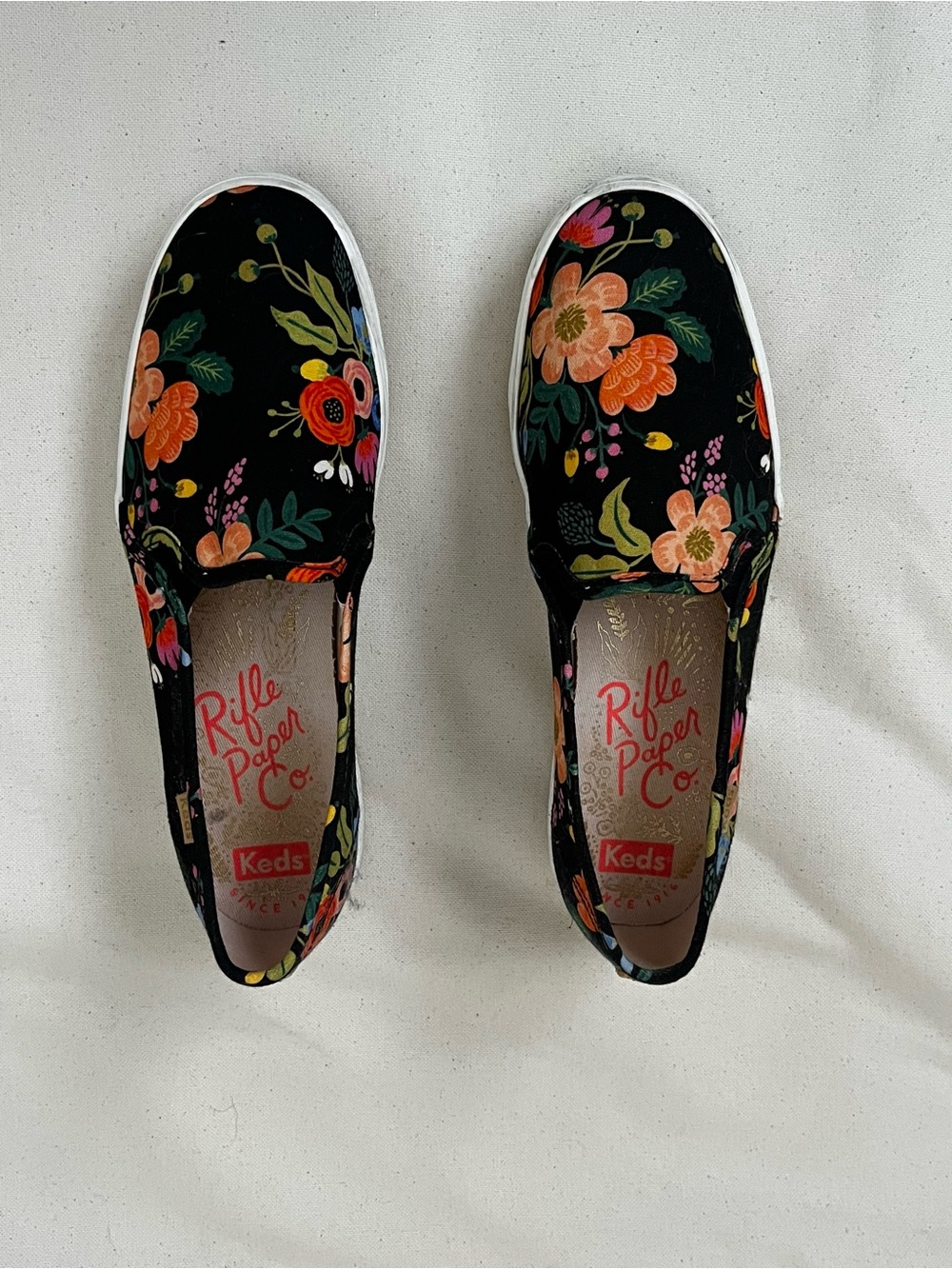 Rifle Paper Co. Black Floral Slip-On Sneakers with Orange & Pink Blooms